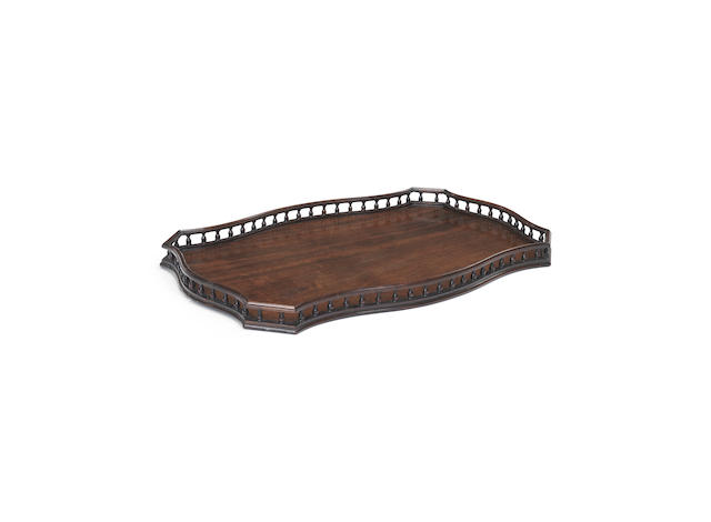 Appraisal: A George III mahogany tray of serpentine form surmounted by