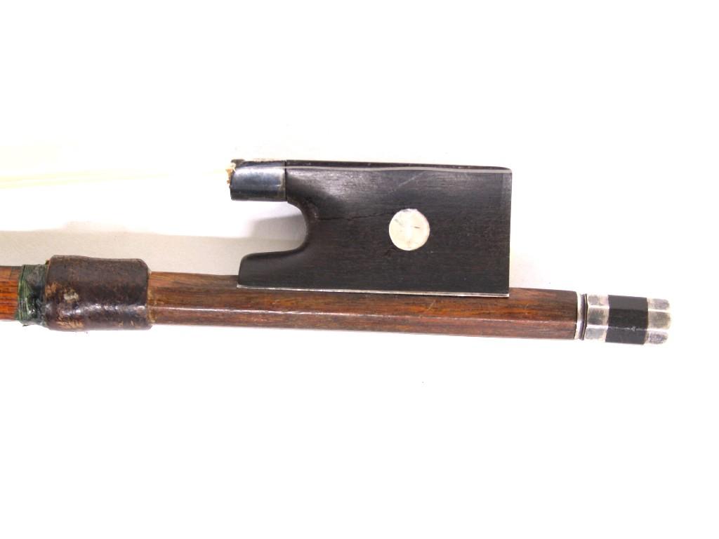 Appraisal: Silver mounted violin bow unstamped the stick round the ebony