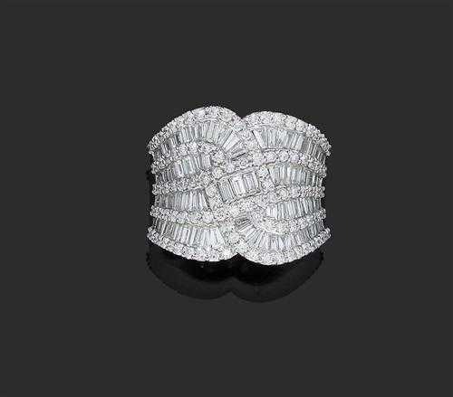 Appraisal: DIAMOND RING White gold Attractive broad ring the slightly concave