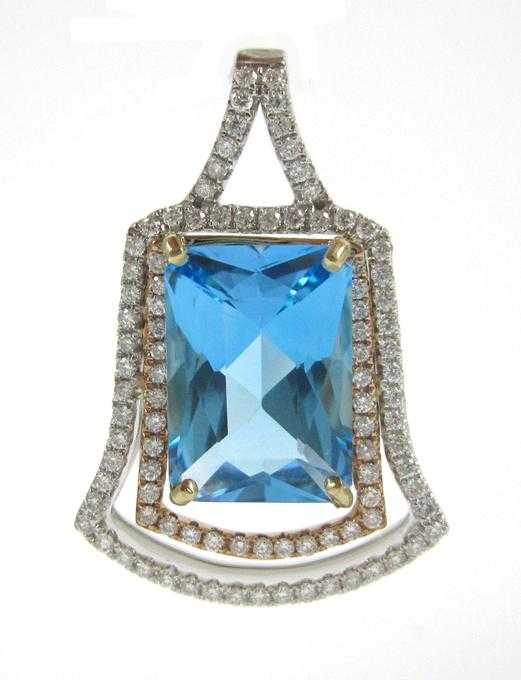 Appraisal: BLUE TOPAZ DIAMOND AND FOURTEEN KARAT GOLD PENDANT The white