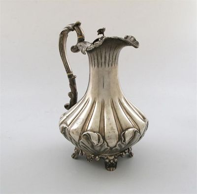 Appraisal: A William IV ewer stylised form with scrolling acanthus leaves