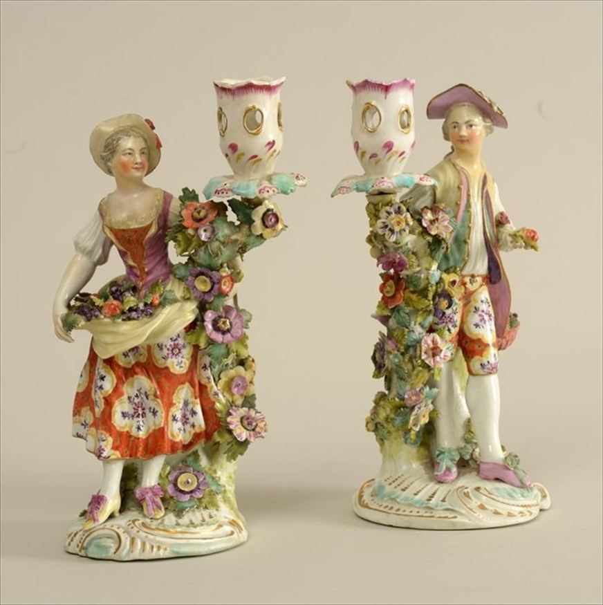 Appraisal: PAIR OF CHELSEA STYLE GILT AND POLYCHROME DECORATED PORCELAIN FIGURAL