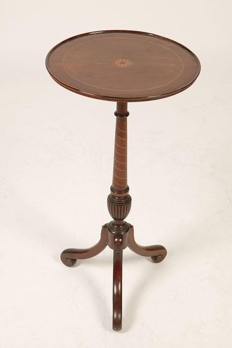 Appraisal: A GEORGE III STYLE MAHOGANY WINE TABLE the circular top