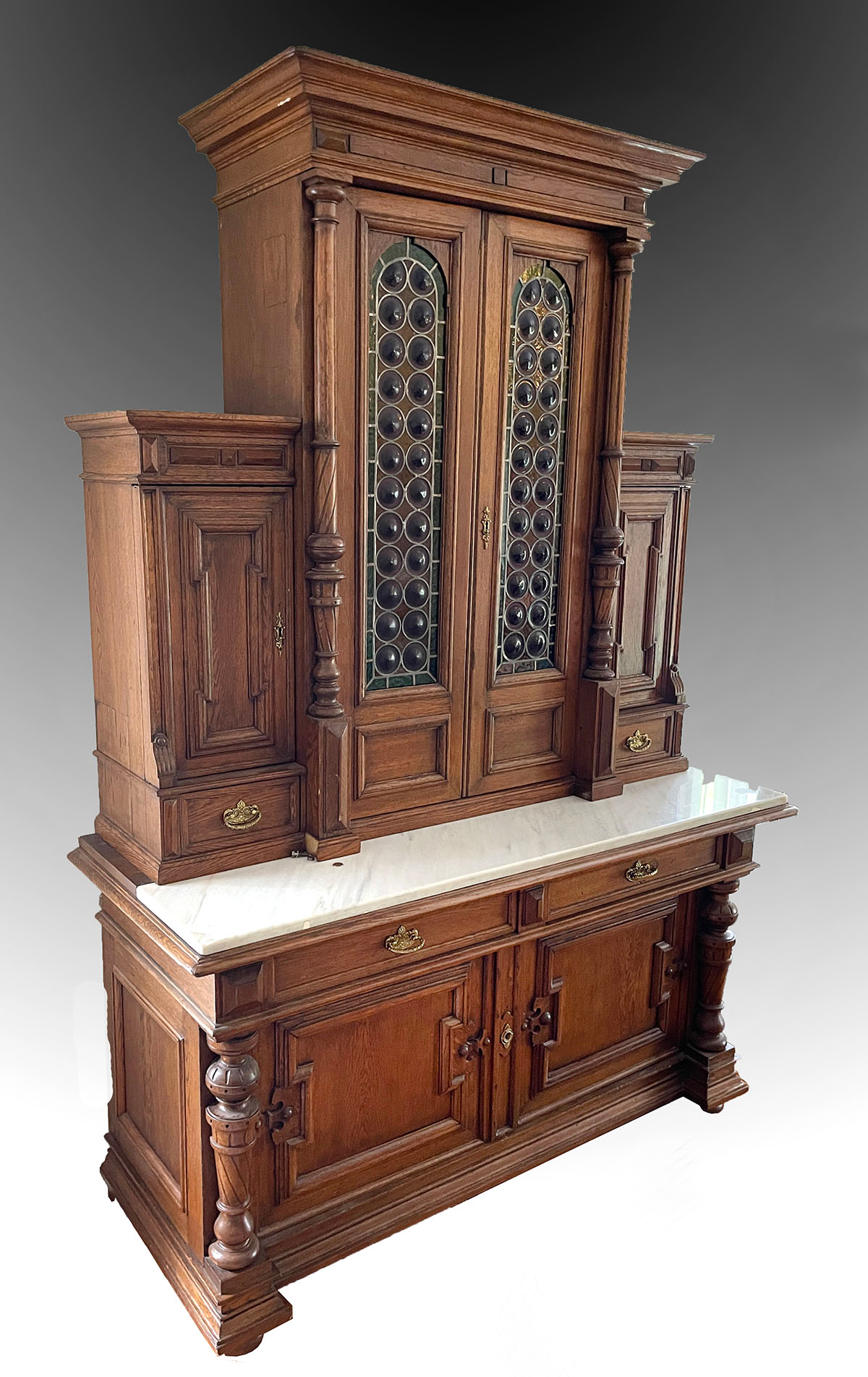 Appraisal: LARGE VICTORIAN WALNUT BOOKCASE WITH RONDEL SHAPED GLASS DOORS Drawer