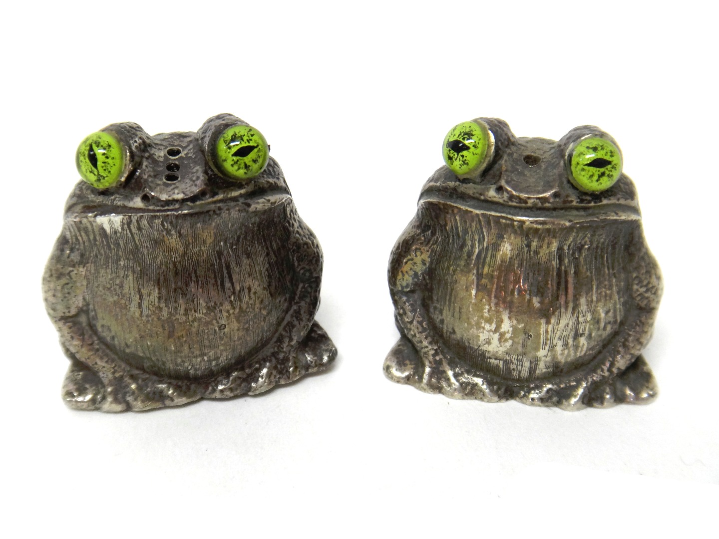 Appraisal: A pair of silver novelty salt and pepper pots designed