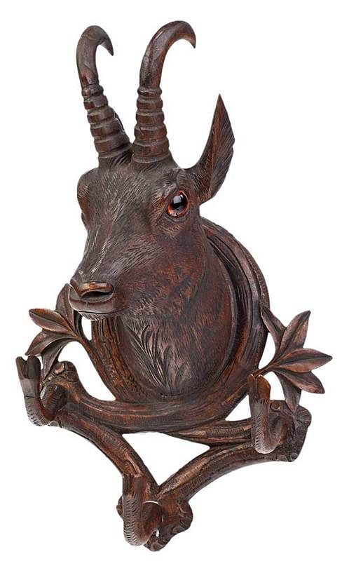 Appraisal: Black Forest Carved Shamois Hat Rack Continental late th century