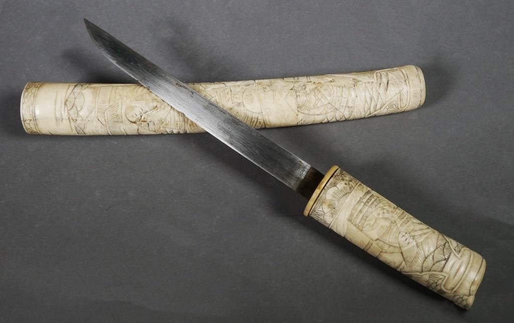 Appraisal: Old Japanese short sword covered with relief carved bone including