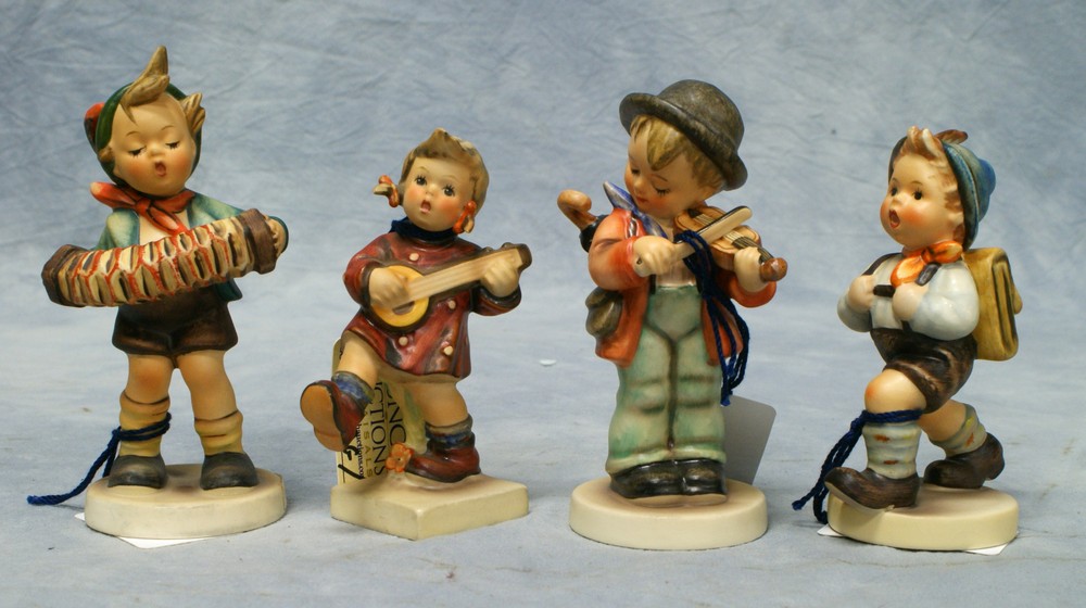 Appraisal: Goebel Hummel figurines Accordian Boy Hum Little Fiddler Hum Happiness