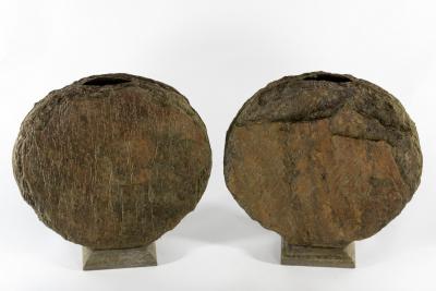 Appraisal: A pair of modern garden sculptures of disc form in