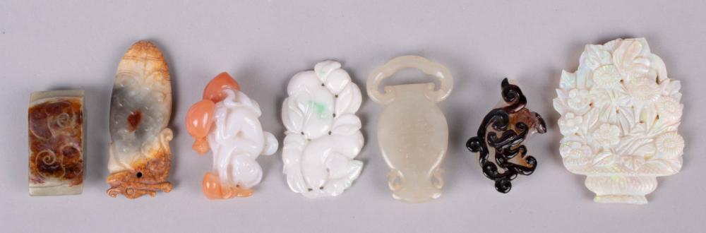 Appraisal: FOUR CHINESE PENDANTS THREE CARVINGS AND AN ARCHAISTIC STYLE JADE