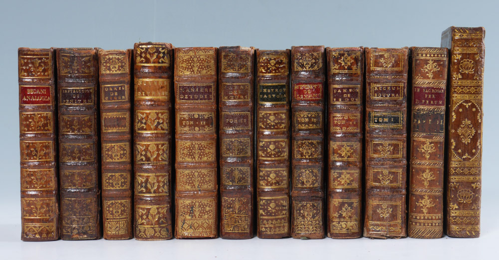 Appraisal: VOLUME ANTIQUARIAN RELIGIOUS BOOKS assorted volumes leather bound embossed spines