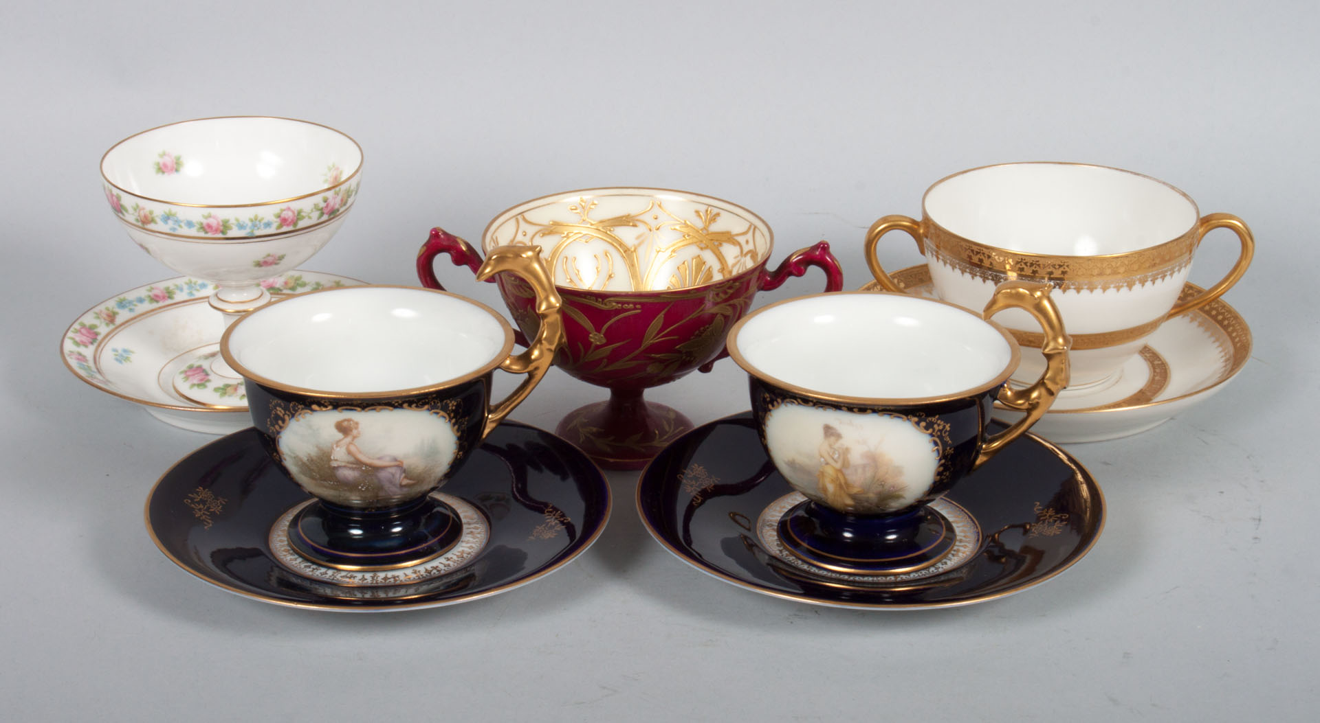 Appraisal: Five assorted Continental porcelain cups saucers early th century pair