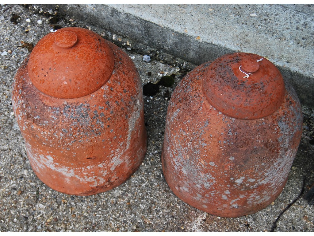 Appraisal: Pair of terracotta rhubarb forcers with cover