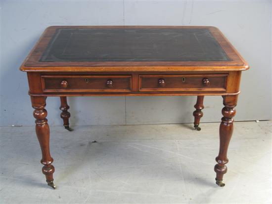 Appraisal: th Century mahogany writing table with two drawers on turned