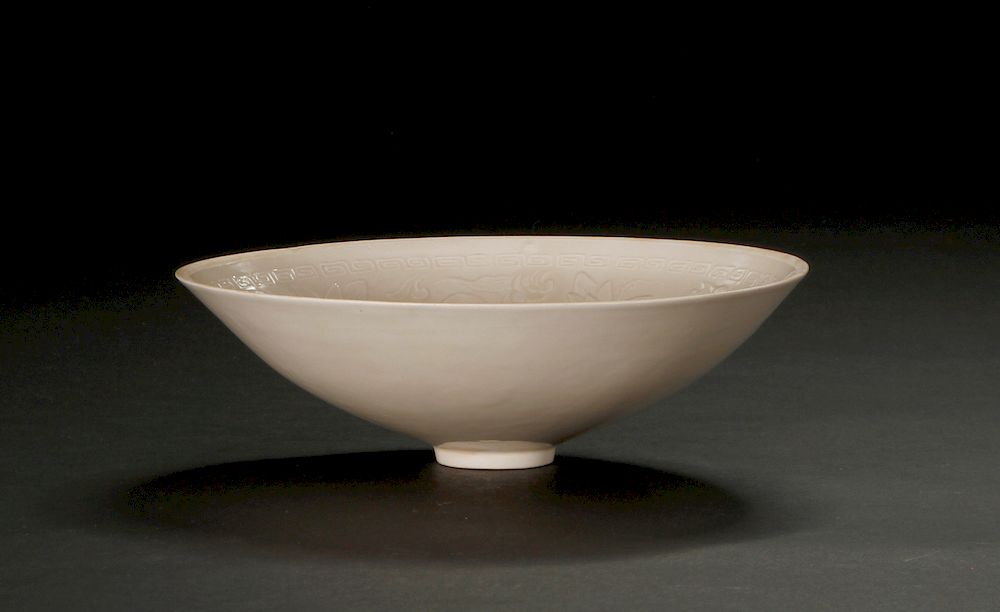 Appraisal: Ding Type 'Floral' Bowl The shallow rounded sides supported on