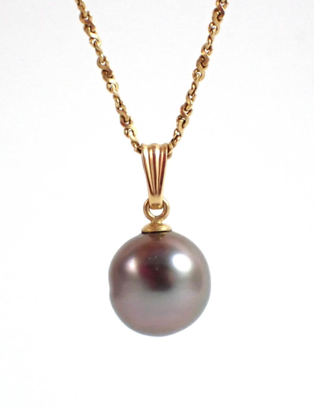 Appraisal: BLACK PEARL AND FOURTEEN KARAT GOLD PENDANT NECKLACE with a