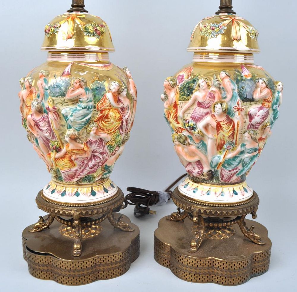 Appraisal: Pair Capo Di Monte Lidded Urns As Lamps with figural