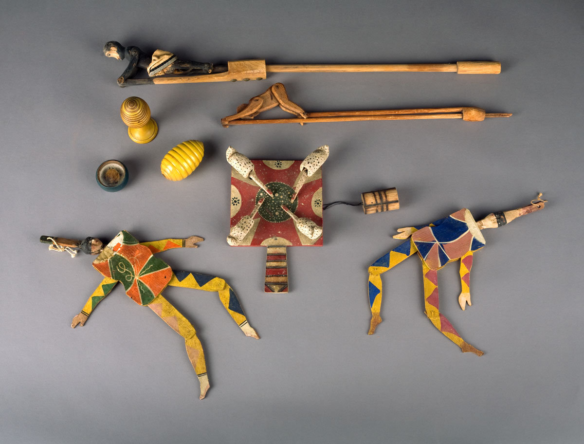 Appraisal: GROUP OF EARLY TOYS INCLUDING TWO HARLEQUIN DOLLS CHICKEN FEEDING