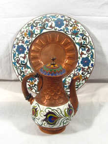 Appraisal: An Eastern enamel on copper coffee pot with matching tray