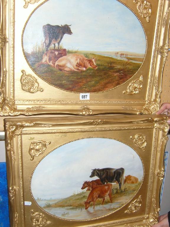 Appraisal: A pair of oil paintings on canvas of cattle grazing