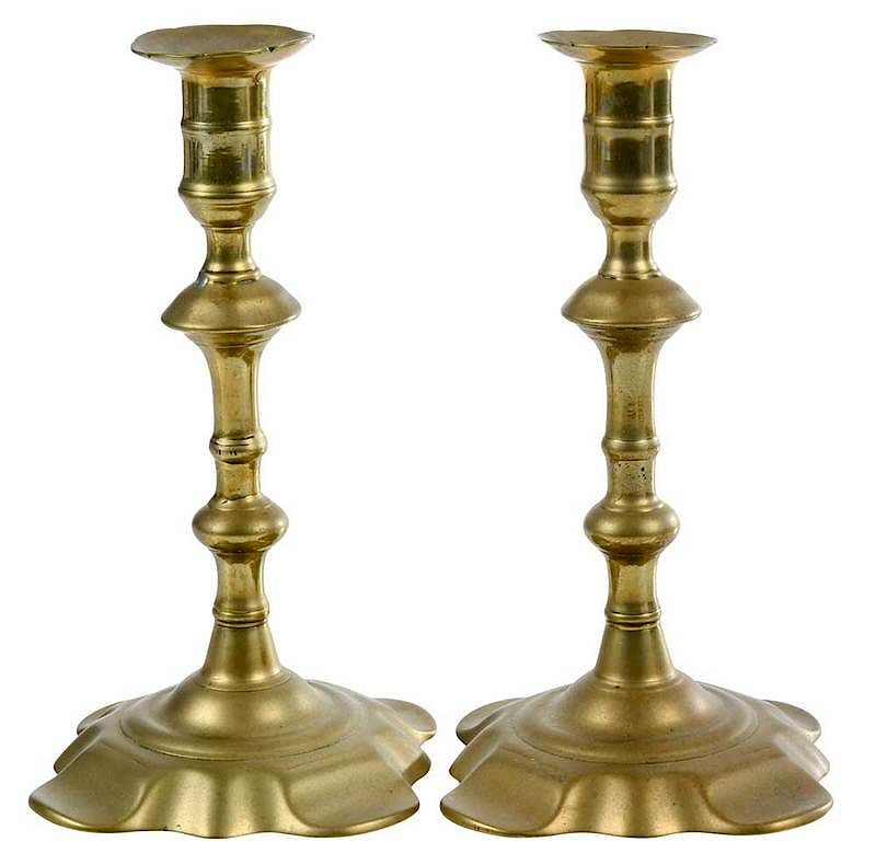 Appraisal: A Pair of George II Cast Brass Candlesticks British mid