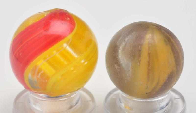 Appraisal: Lot of Handmade Marbles Description The smaller marble is a