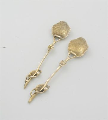 Appraisal: A pair of George III silver gilt naturalistic salt spoon