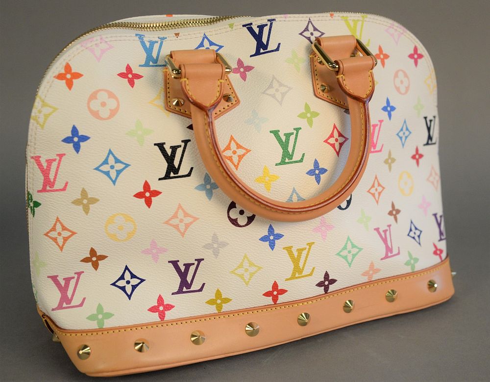 Appraisal: Louis Vuitton white monogrammed tote or handbag red interior with