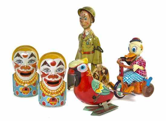 Appraisal: A Collection of Five Pressed Tin Toys comprising three mechanical