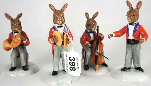 Appraisal: Royal Doulton Bunnykins Orchestra Figures The Cellist DB French Horn