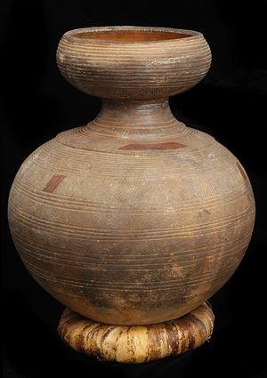 Appraisal: AFRICAN INCISED POTTERY STORAGE JAR The ovoid bowl with horizontal