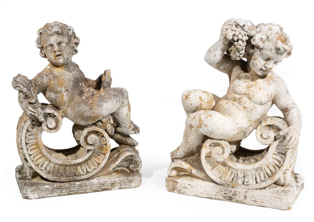 Appraisal: Pair of Cast Concrete Garden Ornaments reclining cherub on scroll