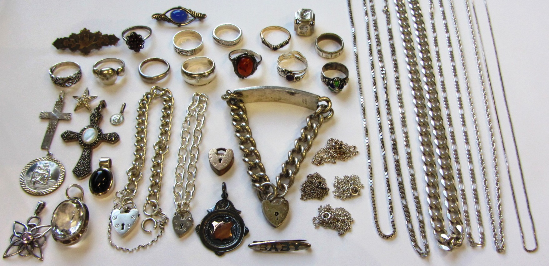 Appraisal: Mostly silver jewellery comprising ten neckchains an identity bracelet two