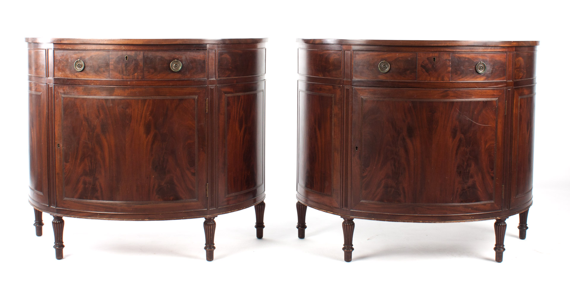 Appraisal: Pair of Potthast Bros mahogany demilune cabinets mid- th century