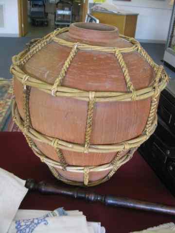 Appraisal: Large Terra Cotta Pottery Floor Vase rattan wrap