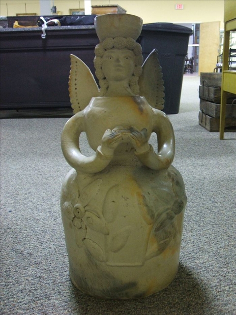 Appraisal: POTTERY FIGURE OF AN ANGEL