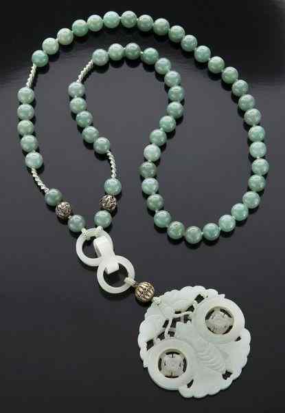 Appraisal: Carved jade pendant with aventurine and silverbeads strung on silk