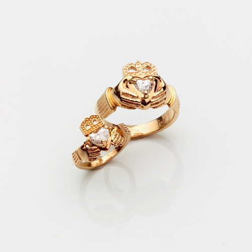 Appraisal: DIAMOND His and Hers claddagh rings in k yellow gold