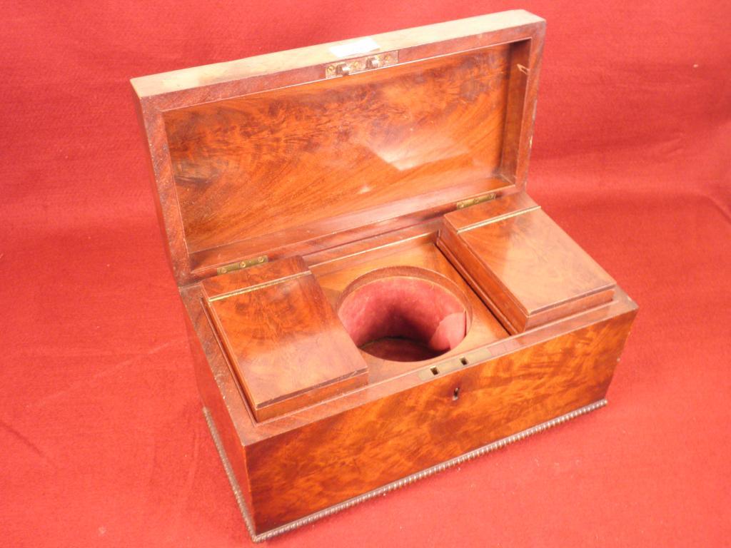 Appraisal: A thC mahogany tea caddy with gilt metal handle and