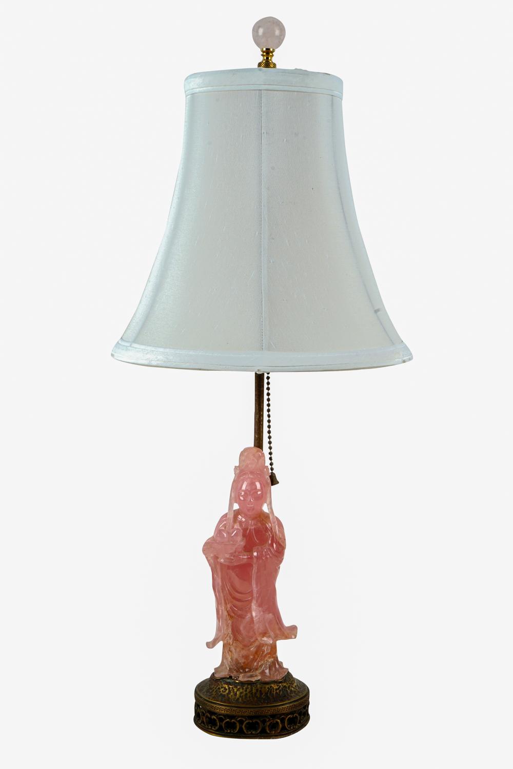 Appraisal: ROSE QUARTZ GUAN YIN BOUDOIR LAMPfigure resting on metal lamp