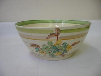 Appraisal: A CLARICE CLIFF BOWL the sides painted with green and