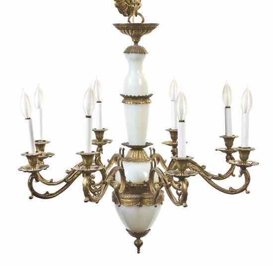 Appraisal: A Gilt Metal and Opaline Eight-Light Glass Chandelier having a