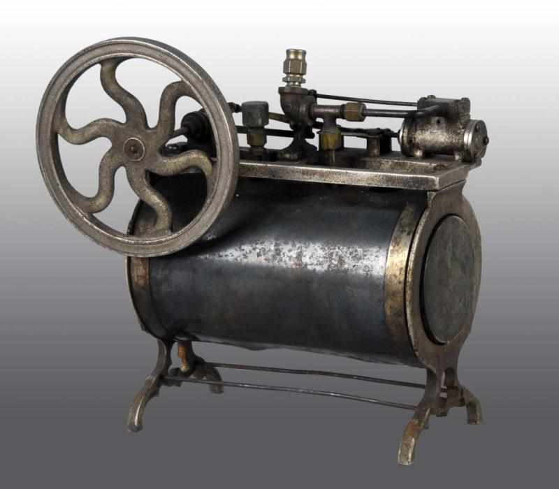 Appraisal: Peerless Horizontal Overtype Steam Engine Toy Description The boiler and