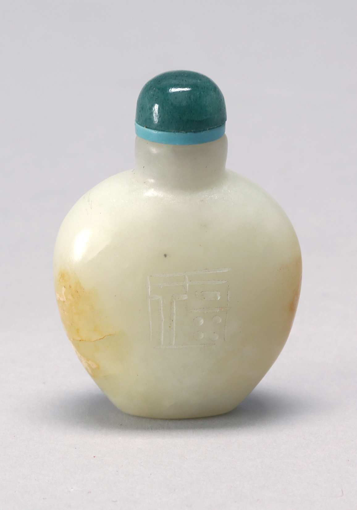 Appraisal: WHITE AND RUSSET STONE SNUFF BOTTLE Circa In spade shape