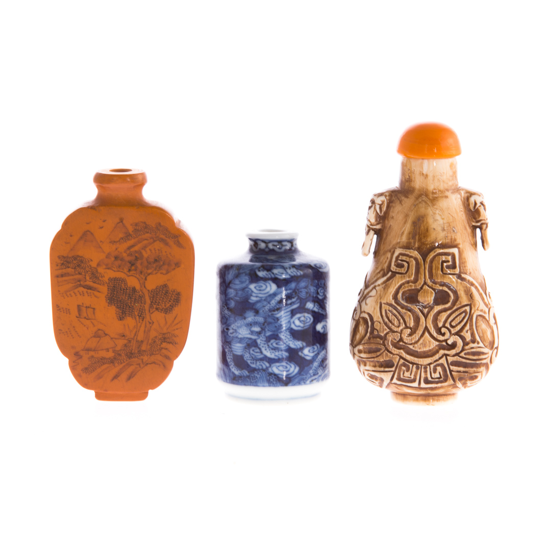 Appraisal: Three Chinese snuff bottles including carved bone snuff bottle with