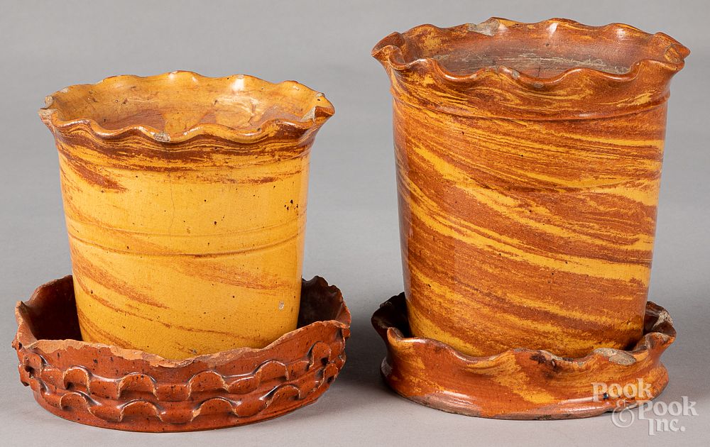 Appraisal: Two redware flowerpots th c with undertrays Two redware flowerpots