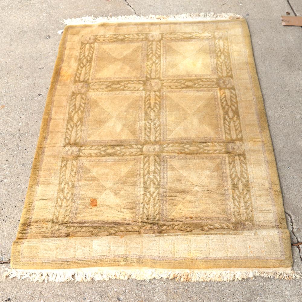 Appraisal: INDO TIBETAN BEIGE AND CREAM WOOL ESTATE CARPET RUG S