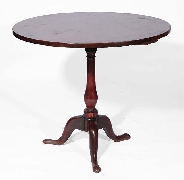 Appraisal: A th Century mahogany circular tip-up circular occasional tableon tripod