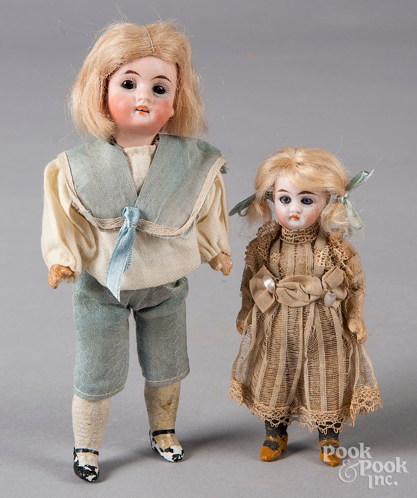 Appraisal: Two German bisque dolls Two German bisque dolls to include