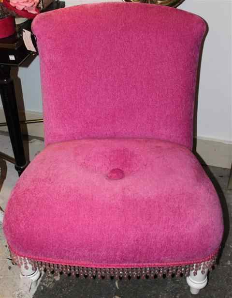 Appraisal: PINK SLIPPER CHAIR the generously padded back rest connected to